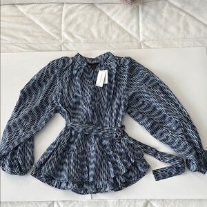 Stylish Black and White Blouse with Belt